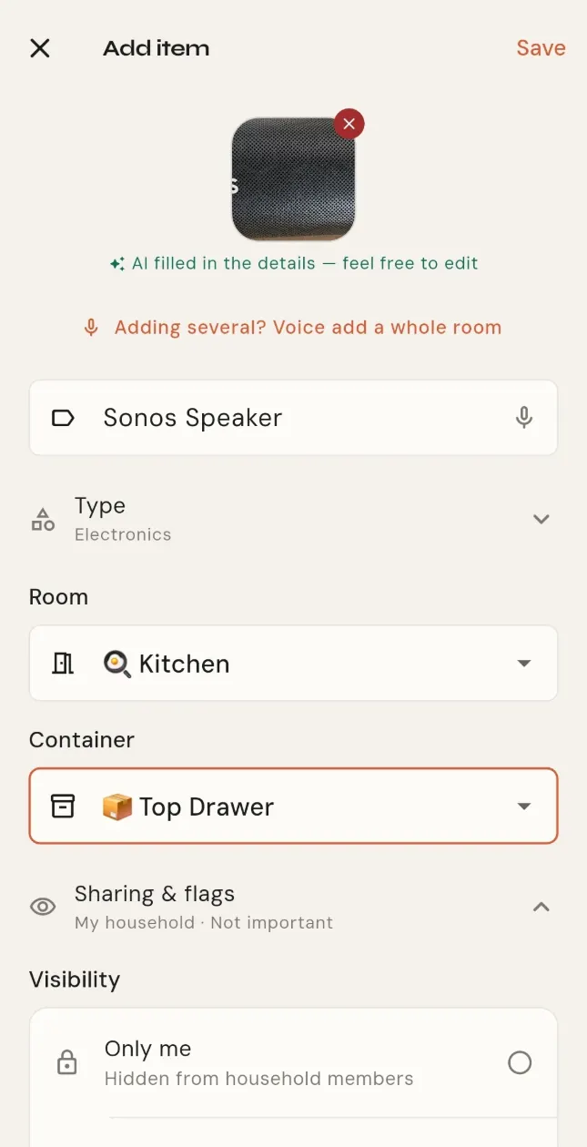 The add-item form after a photo scan, with the photo at the top and the name, category and value filled in.